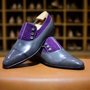 Malone - Le soulier à boutons